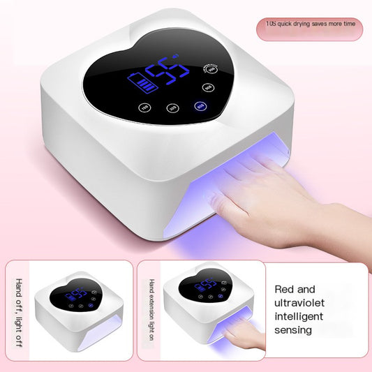 Heart-shaped nail dryer with digital display on a pink background